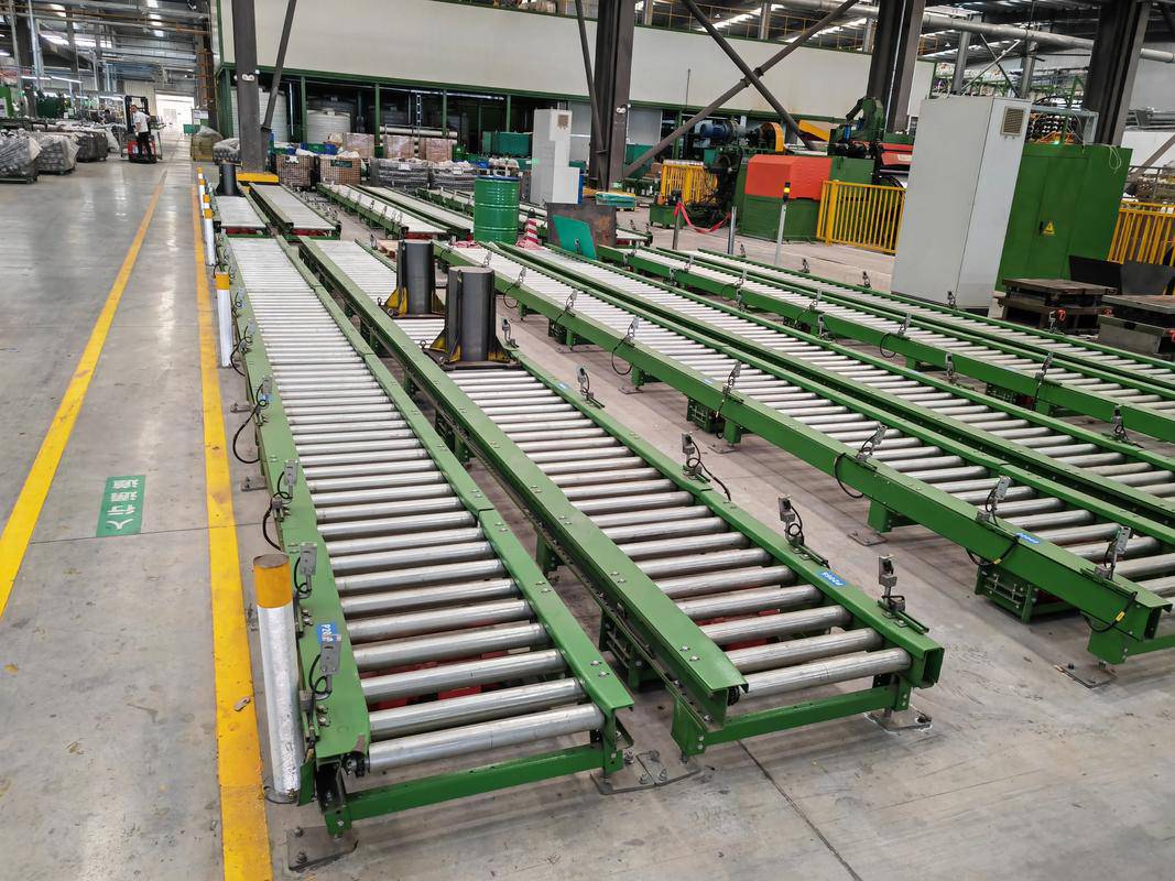 動力滾筒輸送機:多光電多工位緩存的智能補料解決方案